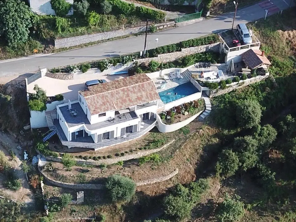 Aerial view of the villa and its terraces